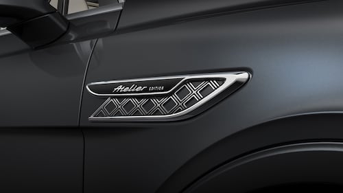 The Bentayga Atelier Edition badge.