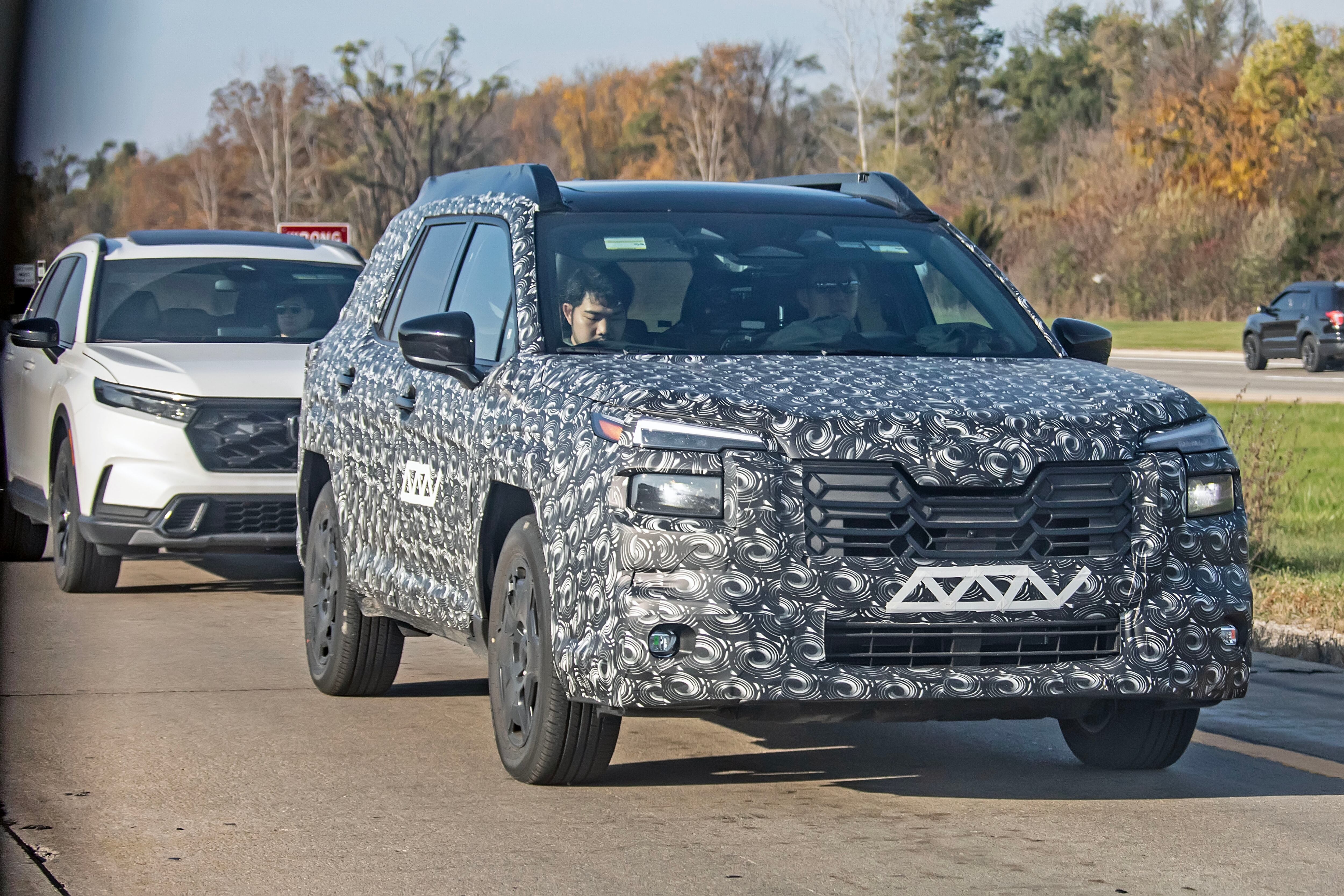 2026 Subaru Outback in camouflage caught testing.