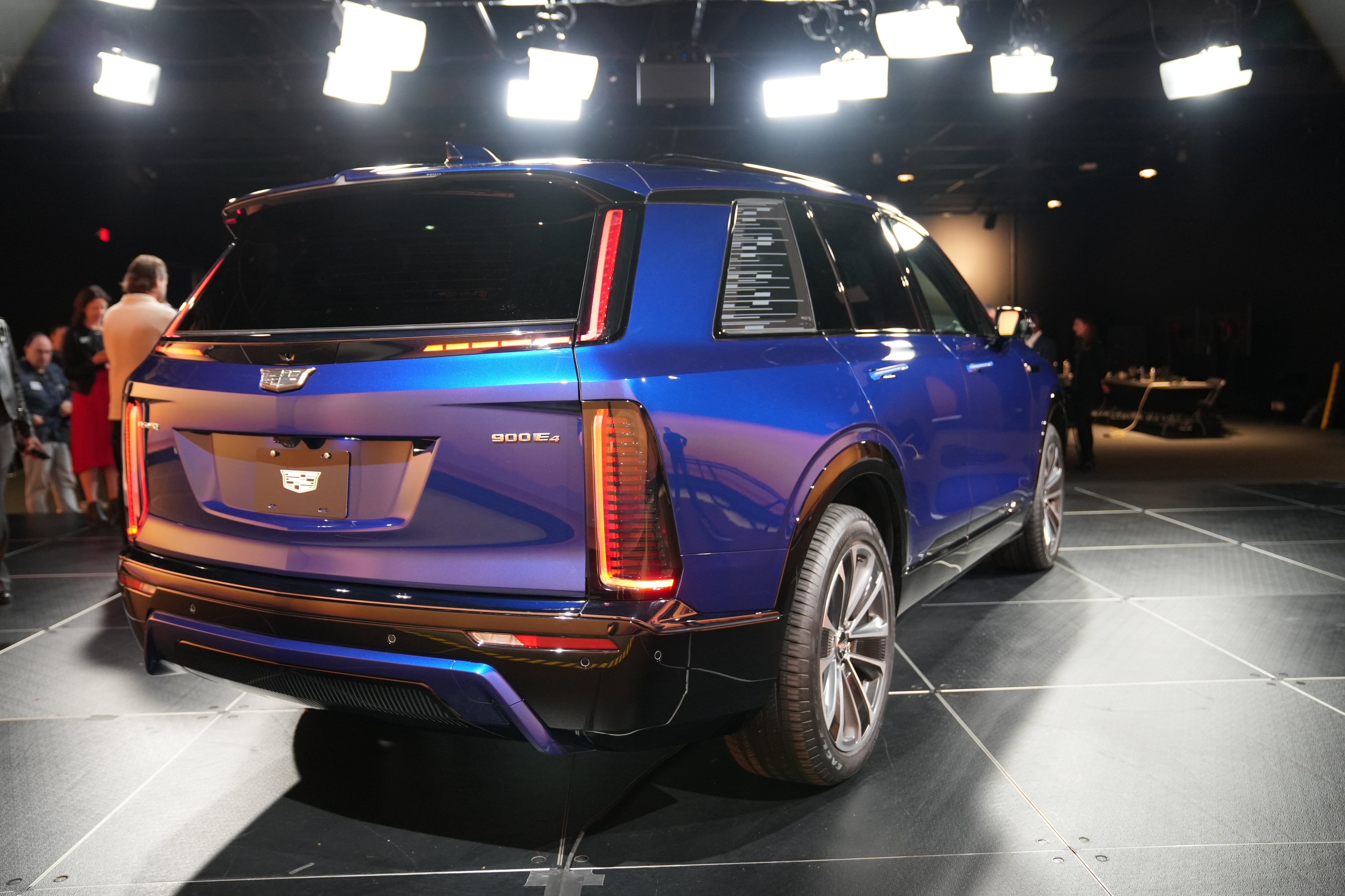 A side view of the 2026 Cadillac Vistiq looking from the rear.