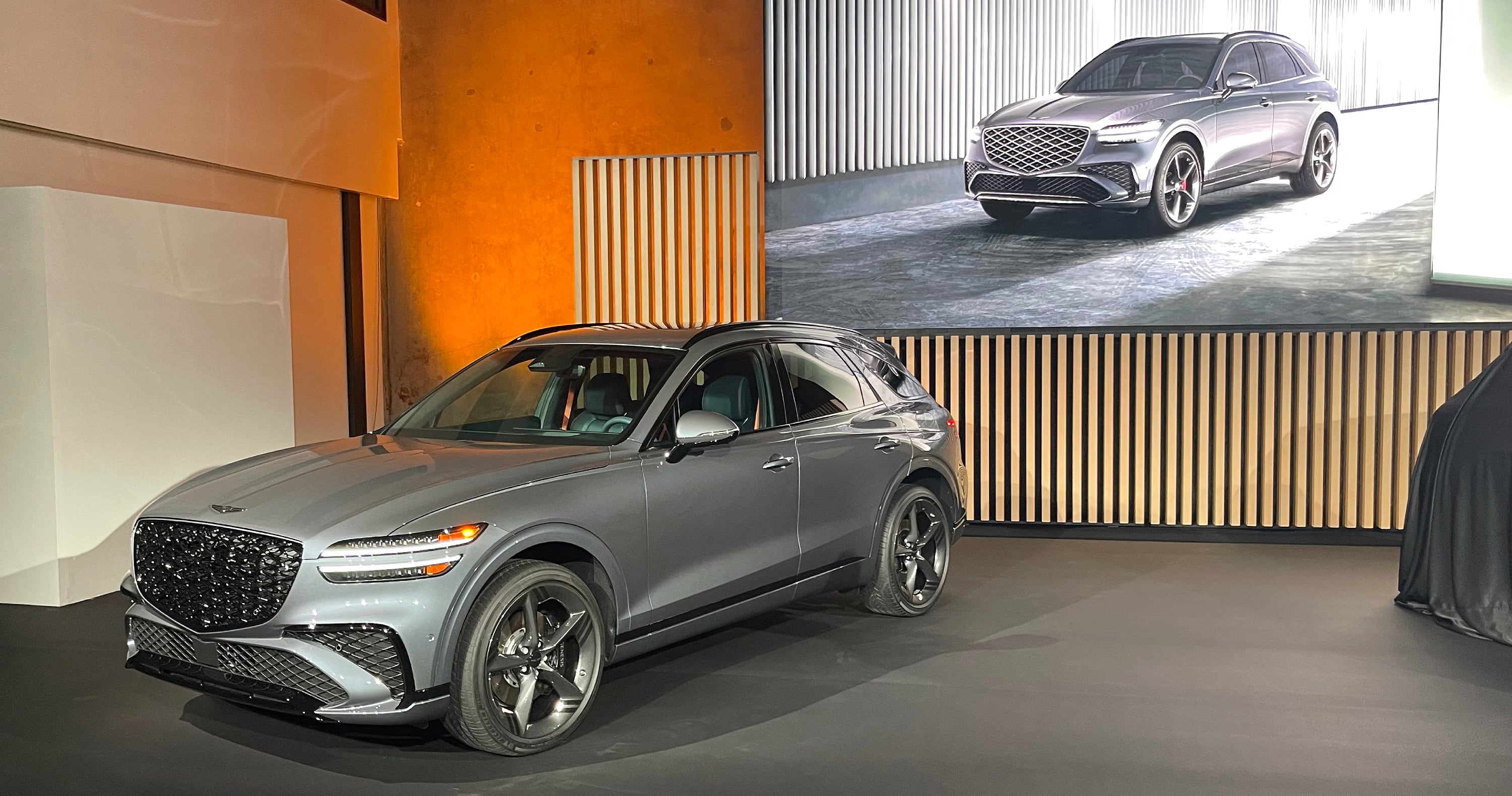 2026 Genesis GV70 on stage at the Los Angeles auto show