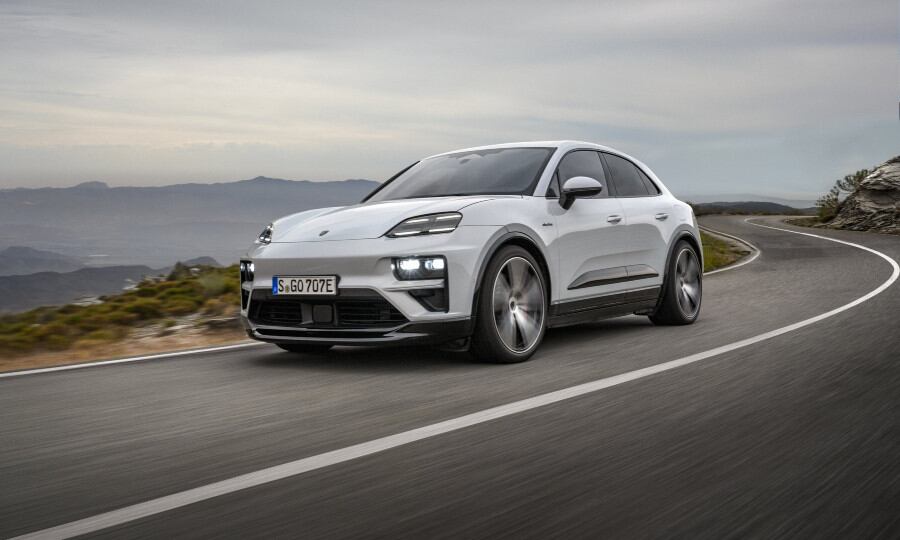 Macan EV main on twisty roads from side left.jpg