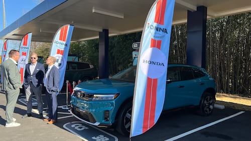 Nico Dettmer of Mercedes-Benz chats with Jay Joseph and Bob Nelson of Honda at Ionna's ribbon cutting in North Carolina.