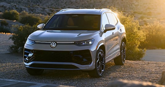 A still 2025 VW Tiguan, front quarter view, at dusk