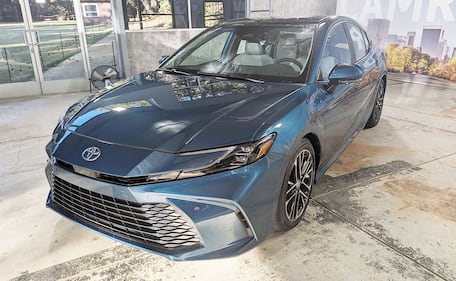 2025 Toyota Camry slightly top front driver quarter