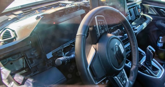 Driver-side view of the steering console within the Subaru Outback test mule.