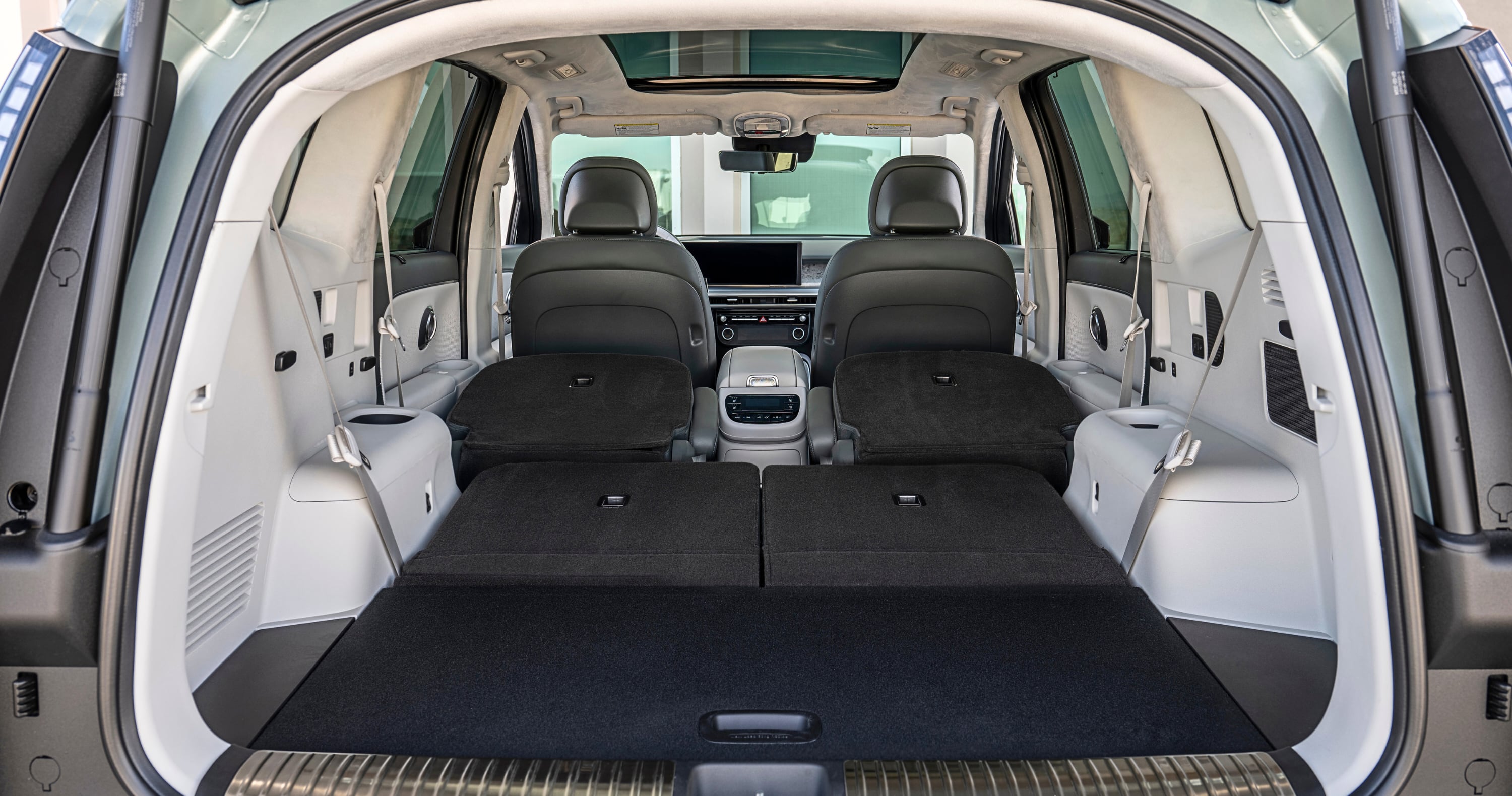 Hatch open and seats down in the rear of the Hyundai Ioniq 9