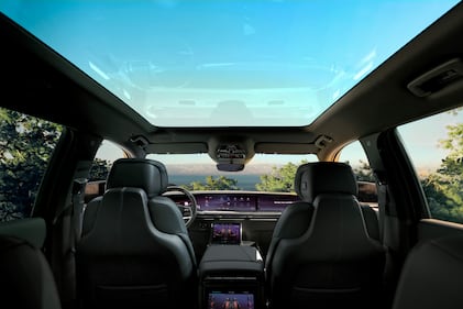 A view of the first and second rows inside the 2026 Cadillac Escalade IQL electric full-size SUV.