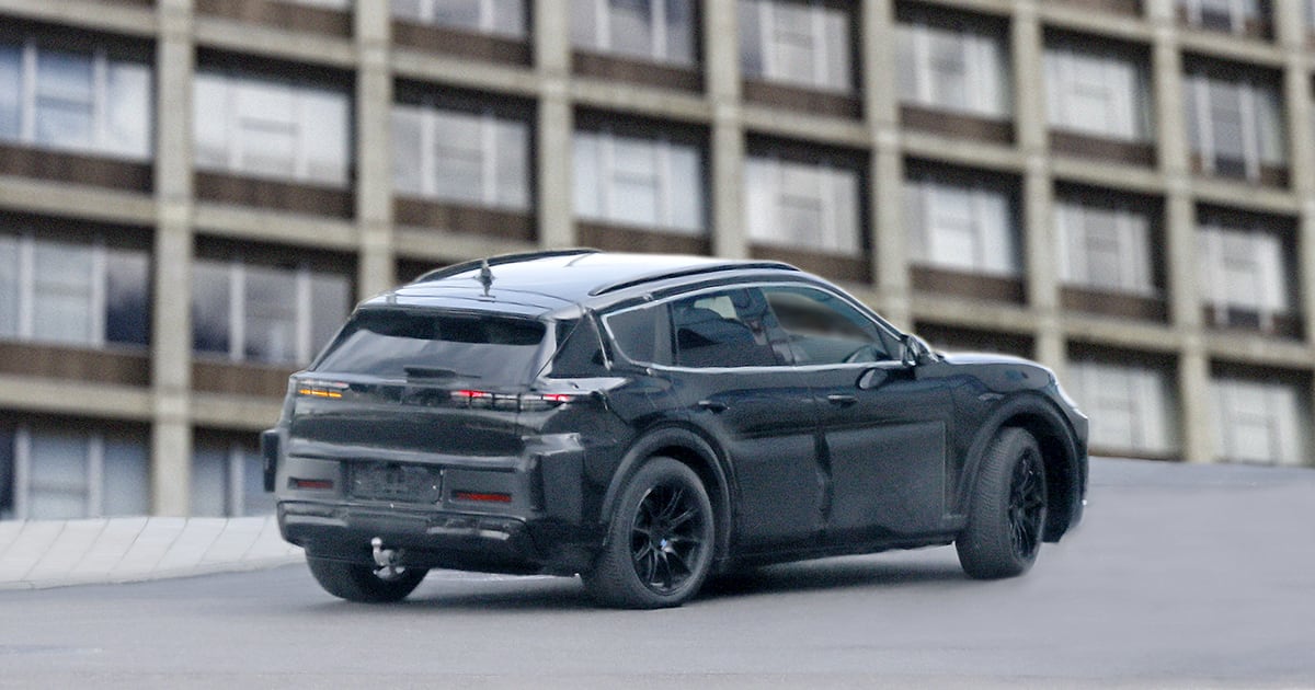 Porsche large crossover EV spy photo rear quarter