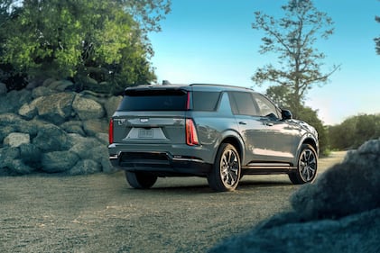 A rear view of the 2026 Cadillac Escalade IQL electric full-size SUV.