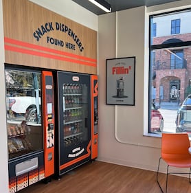 Bold script marks the vending machines at Ionna's charging station in Apex, N.C.