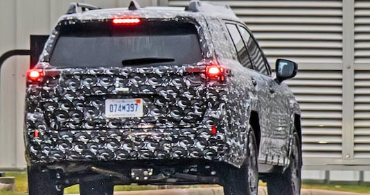 The rear view of the camouflaged Subaru Outback test mule