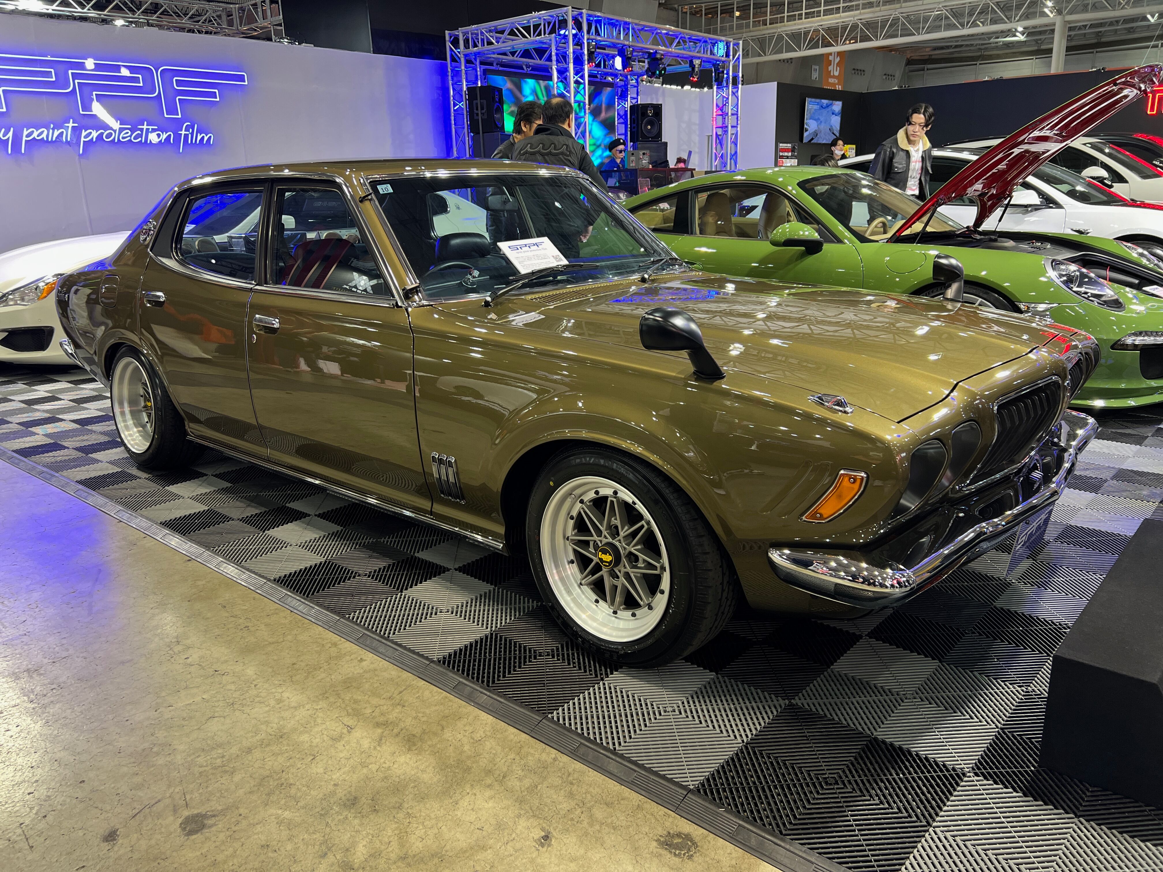 Gold Datsun Bluebird U at 2025 Tokyo Auto Salon